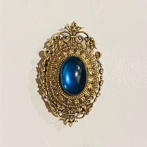 Vintage gold tone Arthur Pepper brooch,scarf clip blue cabochon